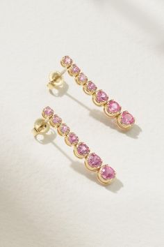 Jennifer Meyer's earrings are prong-set with sparkling pink sapphires that graduate in size the further they get from the post. Handmade from 18-karat gold, they take cues from classic tennis bracelets and look just as good solo or stacked against studs. Luxury Pink Sapphire Earrings For Formal Occasions, Pink Gold Earrings, Classic Pink Diamond Earrings For Formal Occasions, Fine Jewelry Pink Diamond Earrings For Formal Occasions, Pink Diamond Earrings For Formal Events, Fine Jewelry, Pink Diamond Earrings For Formal Occasions, Elegant Pink Sapphire Earrings For Wedding, Luxury Pink Sapphire Earrings, Pink Diamond Drop Earrings In Fine Jewelry Style