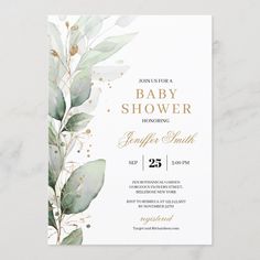 a baby shower is shown with greenery and gold foil on the front, along with white marble background