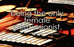 a musical instrument with the words being the only female percussionist on it