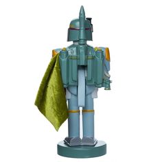 This 10-inch Star Wars™ Boba Fett nutcracker from Kurt Adler is a fun and unique addition to your holiday decor or nutcracker collection. Perfect for Star Wars™ fans and collectors, the bounty hunter Boba Fett is featured here in his green, orange, and grey uniform.•Officially-licensed Star Wars™ nutcracker•Made of wood, resin, and cloth•Approximately 10"•Part of the Kurt Adler nutcracker collection•Perfect for Star Wars™ fans & collectors Elf Shelf Star Wars, Grey Uniform, Nutcracker Gifts, Nutcracker Collection, Lighted Tree Topper, Cascade Lights, Spooky Town, Cluster Lights, Novelty Lights