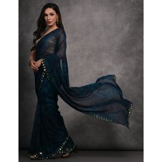 Blue colored saree is made from georgette fabric which is highlighted with beautiful printed mirror work as shown. Comes along with unstitched heavy satin gota blouse piece which you can customise as per your design/style. Occasion - You can wear this saree for casual and daily wear. Note:- the actual product may differ slightly in color and design from the one illustrated in the images when compared with computer or mobile screen. Measurements: Saree : Georgette : 5.5 Mtrs Blouse : Georgette : Festival Georgette Pre-draped Saree With Printed Border, Blue Anarkali Style Pre-draped Georgette Saree, Georgette Saree With Printed Border For Diwali, Semi-stitched Chiffon Pre-draped Saree For Festivals, Pre-draped Chiffon Saree With Mirror Work, Bollywood Chiffon Pre-draped Saree With Mirror Work, Blue Pre-draped Saree In Chanderi With Mirror Work, Festive Georgette Saree With Printed Border, Blue Pre-draped Saree With Mirror Work In Chanderi