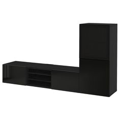 a black entertainment center with two drawers and one door open to reveal the sound system