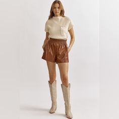 Faux Leather High Waisted Shorts Featuring Super Comfortable Elastic Waistband. Pocket At Sides, Unlined, Woven, Non-Sheer And Lightweight. Material Is 55% Pu And 45% Polyester. Model In Pic Is Wearing Size Small And Is 5’10”. These Shorts Are Not A Junior Fit. Casual Faux Leather Shorts For Fall, Chic Brown Shorts For Fall, Chic Leather Bottoms With Elastic Waistband, Casual Leather Shorts For Fall, Leather Bottoms For Day Out In Fall, Casual Faux Leather Shorts For Spring, Brown Shorts For Day Out In Fall, Brown Leather Shorts For Spring, Casual Leather Shorts For Spring