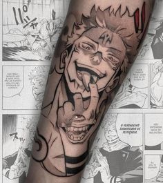 a man's arm with an anime character tattoo on it