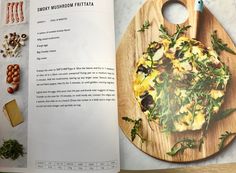 an open cookbook showing the contents of a pizza on a cutting board with mushrooms and other ingredients