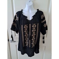 Nwot. There Is No Size Tag But It Is A Large Size. It Measures At 28 Inches From Top Of Shoulder To Bottom Of Blouse. Across From Pit To Pit It Measures At 24 Inches. Black Embroidered Peasant Top, Black Peasant Blouse With Floral Embroidery, Black Embroidered Tunic Blouse, Spring Embroidered Black Peasant Top, Black Embroidered Peasant Blouse, Peasant Style Embroidered Black Blouse, Black Peasant Top With Floral Embroidery For Festivals, Black Embroidered Peasant Top For Festivals, Black Folk Style Peasant Top