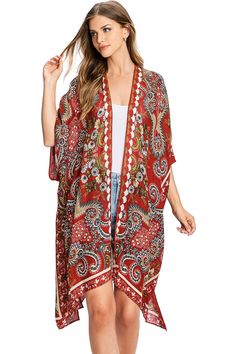 Effortless kimono silhouette with an ultra light scarf feel, an open-front and bold floral and paisley prints. Perfect for layering over casual outfits or over a swimsuits. CARE | Hand Wash Cold CONTENTS | 100% Viscose MEASUREMENTS | 38"/97 cm Top to Bottom (Size O/S) MODEL | 5'8 - wearing O/S IMPORTED Casual Long Printed Cover-up, Boho Print Cover-up With Kimono Sleeves, Casual V-neck Kimono With Boho Print, Flowy Open Front Printed Cover-up, Red Floral Print Kimono For The Beach, Casual Patterned Kimono For Beach Cover-up, Beach Kimono With Boho Print And Open Front, Beachwear Kimono With Boho Print And Open Front, Beachwear Boho Print Open Front Kimono