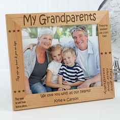 a family picture frame with the words, my grandparents we love you with all our hearts