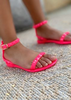 Brighten up their summer style with these Kid's Aria Neon Pink Sandals! Not only will they glow (literally), but they offer all-day comfort thanks to their soft soles and adjustable straps. Perfect for little ones who want to stand out in a crowd - and also want to stay comfy all day long. Who said you can't have it all? Kid's Jellie sandal Studded detail 0.5" flat heel The whole size only Mommy and me sandals Mommy and me shoes Mother and daughter matching shoes Matching Shoes, Pink Sandals, Mother And Daughter, For Sale Sign, Mommy And Me, Summer Sale, Neon Pink, Handbag Accessories, Trend Setter