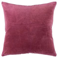 a purple velvet pillow on a white background