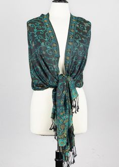 Pashmina Scarf with Black & Teal Twisted Vine Pattern - #62 - These pashmina scarves are the ideal winter accessory! With so many different colors and designs to choose from, you're sure to find the perfect scarf for everyone on your gift list - including yourself. Best of all, they look great with handmade jewelry designs.approximate size: 28x70 inches100% Pashmina Scarves, Scarves, Cherry Tree Beads, Pashmina Scarf with Black & Teal Twisted Vine Pattern - #62 Green Pashmina Shawl For Winter, Green Pashmina Scarves For Winter, Green Pashmina Winter Scarf, Green Pashmina Shawl Scarf, Traditional Green Winter Scarf, Black Bohemian Pashmina Shawl For Winter, Black Bohemian Pashmina Shawl, Pashmina Scarf, Unique Handmade Jewelry