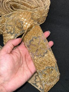 Elevate your projects with our luxurious Golden Embroidered Lace, featuring intricate golden threads and shimmering gota. This exquisite lace trim adds a touch of opulence to any sewing or crafting endeavor. Perfect for enhancing garments, creating elegant accessories, or embellishing home decor items Price: $8 per yard SHIPPING POLICY We ship world wide. Most orders are dispatched within 48 business hours after order confirmation. We ship by air to most locations. Shipping overages above $4.00 are refunded at the time of shipping label purchase. * I combine shipping if you purchase more than one item and refund the difference. * If there are any issues with shipping, delivery etc., please feel contact us and we will resolve the issue  ABOUT FEEDBACK/REVIEWS: We operate this store with hon Festive Gold Brocade Embroidered Fabric, Elegant Brocade Dupatta With Gold Embroidery, Gold Bollywood Style Brocade Embroidered Fabric, Gold Dupatta For Formal Eid Occasions, Traditional Gold Embroidered Fabric For Formal Occasion, Traditional Gold Embellished Dupatta, Gold Embellished Dupatta For Eid, Gold Embroidered Fabric With Zari Work For Festive Occasions, Festive Gold Embellished Dupatta