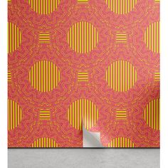 an orange and yellow wallpaper with circles on it, in front of a red background