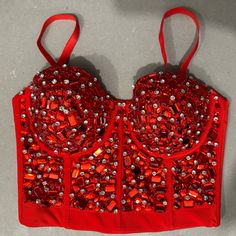 Brand New And Still In Original Packaging Red Rhinestone With White Rhinestone Embellished Corset Top. There Are Adjustable Hooks On The Back To Allow For Different Torso Widths. It Is A Cropped Length. The Straps Are Removable. There Are Non-Slip Reinforcements Throughout The Garment To Keep It Exactly Where You Want It. This Bustier Glimmers In The Light! It’s A Show Stopping Piece. Great For Costumes, Performances, Dance Competitions, Birthday Outfits, Celebrations, Or Simply Dressing Up! Can Surprise Dance Outfits, Audition Outfit, Rhinestone Corset, Embellished Corset, Dance Competitions, Surprise Dance, Simply Dress, Corset Bustier, Birthday Outfits