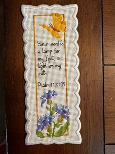 a cross stitch bookmark with the words, your word is a lamp for my heart and light on my path