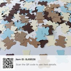 a pile of brown and blue teddy bears cut out of paper with qr code to see them details