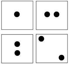 four squares with black dots on them