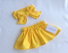 Yellow skirt Baby Skirt Toddler Skirt Baby Girl Outfit Cute Cotton Skort With Lined Skirt, Cute Fitted Cotton Skirt, Playful Cotton Skort For Summer, Summer Playful Cotton Skort, Playful Cotton Lined Skirt, Yellow Cotton Skort, Yellow Cotton Skort With Lined Skirt, Bow Headwrap, Skirt Bow