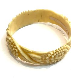 Antique classic Bakelite bracelet with precious floral lavoration and inlays Elegant Adjustable Carved Bangle, Carved White Bracelet Jewelry, White Carved Bracelet Jewelry, White Carved Bracelet, Elegant Carved Bracelets As Gifts, Elegant Carved Bracelets For Gifts, Elegant Carved Bracelet, Elegant Carved Cuff Bracelet, Elegant Carved Adjustable Bracelet