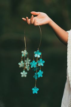 A dramatic cascade of verdant blossoms float from a hand hammered band for a stunning dose of bohemian glamour. All brass construction with natural verdigris patina. Nickel and lead free. Jewelry Inspired By Nature, Elegant Patina Jewelry For Weddings, Bohemian Green Jewelry With Flower Decoration, Bohemian Glamour, Trash Fashion, Metal Art Jewelry, Beach Jewelry Boho, 2024 Inspiration, Bold Statement Jewelry