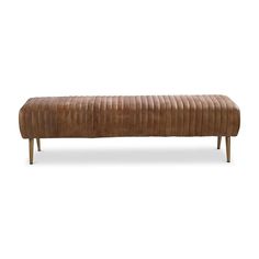 an upholstered bench with wooden legs and a brown leather finish, on a white background