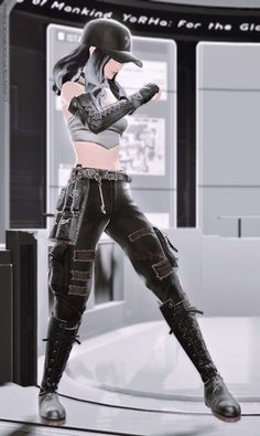 a woman in black leather pants and boots standing on a white floor with her hands behind her back