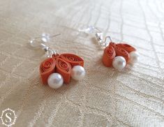 These earrings in the handmade with paper and white pearls are a great gift for her.  Gracefully curving elements made with the filigree technology, delicately ornamented and designed to impress and attract attention! These lightweight unique earrings are perfect to celebrate a special occasion. Length: 1.5 cm; Drop length: 4 cm; Width: 1.8 cm IT WILL BE MY PLEASURE TO MAKE IT SPECIAL FOR YOU IN THE COLOR YOU WANT!  If you want something different, please contact me. Paper Quilling Earrings, Bumble Bee Earrings, Food Necklace, Paper Quilling Jewelry, Quilling Earrings, Quilled Jewellery, Country Jewelry, Quilling Jewelry, Paper Earrings