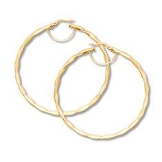 Designed to be noticed, these 50mm round hoop earrings of 10K yellow gold include a graceful twist, and are secured with hinged backs. Gold Stock, Jewelry Education, Jewelry Advice, Jared The Galleria Of Jewelry, Diamond Guide, Earring Backs, Cultured Pearls, Designer Earrings, Fashion Earrings