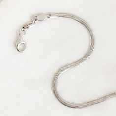 A bold snake chain bracelet crafted in sterling silver. This statement bracelet can be styled on its own or stacked with other bracelets for a contemporary look.



Snake chain has a width of 2.3mm

Bracelet has an adjustable chain that can be set between 6” to 7” long Chain Bracelet Silver, Snake Chain Bracelets, Silver Chain Bracelet, Statement Bracelet, Bracelet Crafts, Bracelet Silver, Snake Chain, Silver Bracelets, Chain Bracelet