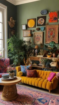 a living room filled with furniture and lots of plants