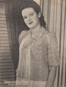 an old black and white photo of a woman wearing a blouse with crochet on it