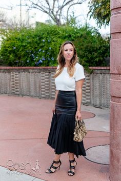 Stacey shares her new faux leather midi skirt, talks about how to care for the faux leather and how to style them.