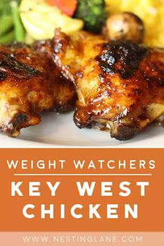 the words weight watchers'key west chicken on a plate with broccoli and carrots