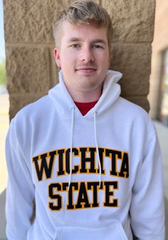 Champion Wichita State Shockers Arch Name Hoodie - White Collegiate White Hoodie For Fall, White Collegiate Hoodie For Fall, White School Spirit Hoodie For Sports, Collegiate White Sweatshirt With Drawstring Hood, White Hoodie For College School Spirit, White Collegiate Sweatshirt With Drawstring Hood, Collegiate White Hoodie For Sports Season, White Collegiate Hoodie For Sports, White School Spirit Hoodie For Winter