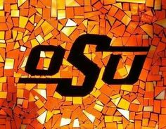 an orange mosaic with the word dsu on it