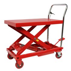 a red scissor cart with two wheels