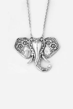 The ears of this gorgeous elephant have been created from the handles of two antique spoons, and the trunk was formed from a different spoon handle. Our goal was to bring the elegance of the past into a classically beautiful piece of modern jewelry. Chain Length: 30" Pendant: 2" x 1 3/4" Sterling Silver Chain & Findings: Sterling Silver ***We know that the shipping for this item will be higher due to our shipping price being based on subtotal so we have adjusted the price of this item lower Spoon Jewelry Diy, Elephant Decal, Silver Spoon Jewelry, Fork Jewelry, Flatware Jewelry, Silverware Art, Sterling Silver Spoon Ring, Silver Jewlery, Antique Spoons