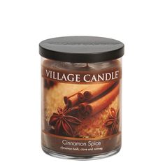 a candle with cinnamon spice in it