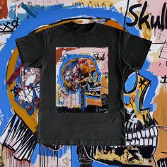 a black t - shirt with an image of a skull on it