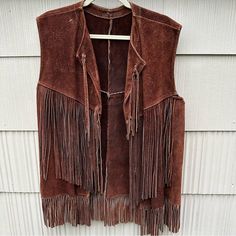 Incredible Unisex Vest Made Of Heavyweight Natural Suede With Gorgeous Fringe On Front & Back Sides. Probably Meant For Men/Women Size M-L But Can Fit A Wide Range Of Sizes Due To Open Front Style. Approx Length From Top Of Neck To Bottom Is About 28in Plus 5in Of Fringe At Bottom, Approx 22in Laying Flat Across Chest Measuring Under Pit. Awesome Vintage Westernwear Vibe! In Nearly New Condition. Suede Fringe Vest, Fringe Vest, Suede Fringe, Western Wear, Front Open, Jackets For Women, Jackets & Coats, Womens Sizes, The Incredibles