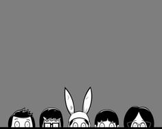 some people with bunny ears are standing in front of a black and white background,