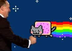 a man in a suit and tie is holding an object with a cat on it