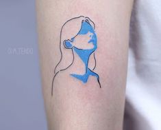 a woman's arm with a blue line drawing on the left side of her body