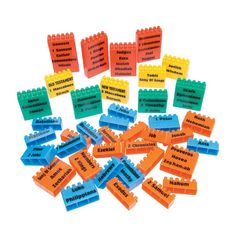 a pile of lego blocks with words written on them