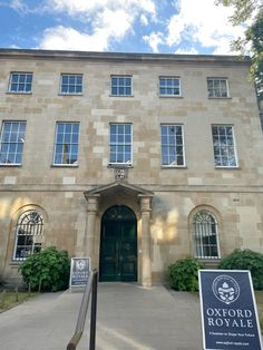 the front entrance to an old building with a sign in front of it that says oxford royale