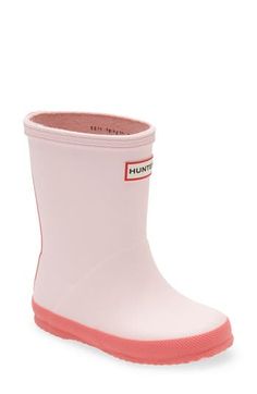 Comfort and quality define an iconic water-tight boot featuring a grippy mini-lug sole and a subtle tonal design encircling the top. Pull-on style Removable insole Hunter boot socks are sold separately In hot or humid weather, natural latex rubber releases a protective wax film; simply wipe it off with a damp cloth Rubber upper/textile lining/rubber sole Imported Kids' Shoes Hunter Boots Socks, Hunter Kids, Hunter Boot, Humid Weather, Tights And Boots, Rain Boot, Natural Latex, Boot Socks, Lug Sole