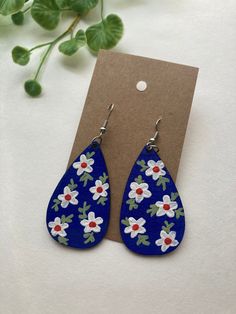 Hand painted on extremely light weight wood. Painted on both sides. Tear drop is two inches in length and just over 1 inch wide. Hand Painted Earrings Wood, Wood Jewelry Diy, Felt Crafts Patterns, Earrings Wood, Hand Painted Earrings, Painted Earrings, Painted Jewelry, Hand Painted Jewelry, Hand Painted Leather