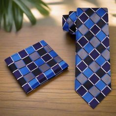 Dapper Blue Business Ties, Blue Ties With Pocket Square For Father's Day, Blue Tie With Pocket Square For Father's Day, Blue Tie For Black Tie Event And Father's Day, Blue Ties With Pocket Square For Business, Blue Tie With Pocket Square For Business, Blue Ties With Pocket Square For Office, Blue Business Suit And Tie Accessories With Pocket Square, Multicolor Pocket Square For Black Tie Events