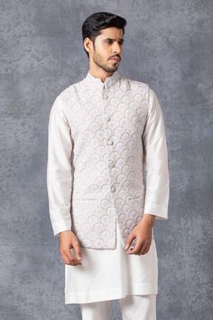 Ice grey Nehru jacket with embroidered motifs and front button placket.
Components: 1
Fabric: Pure Georgette
Neckline: Mandarin
Sleeve Length: Sleeveless
Color: Grey
Embroidered
Note: Inner kurta and pant worn by the model is not for sale - Aza Fashions Nehru Jacket For Men, Embroidered Motifs, Jacquard Jacket, Nehru Jacket, Nehru Jackets, Designer Menswear, Kurta With Pants, Mens Designer Fashion, Jacket For Men