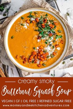 creamy smoky butternut squash soup in a white bowl